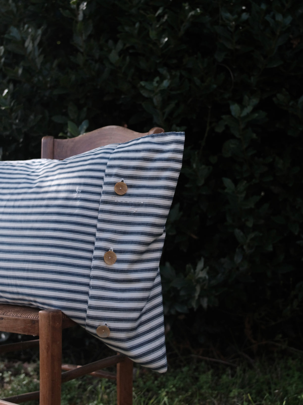 La housse de coussin rayée extra-large
