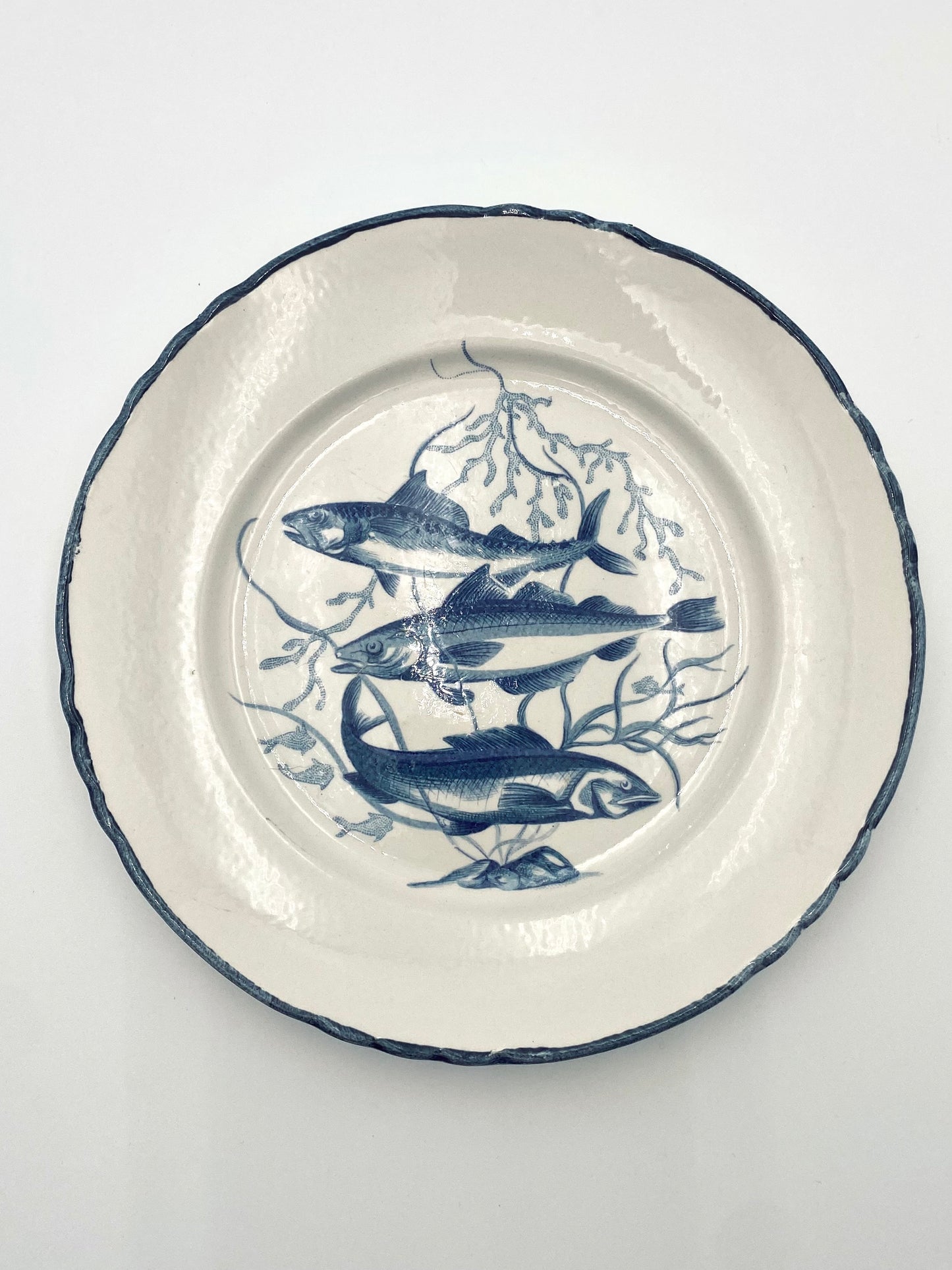 L'assiette avec trois poissons