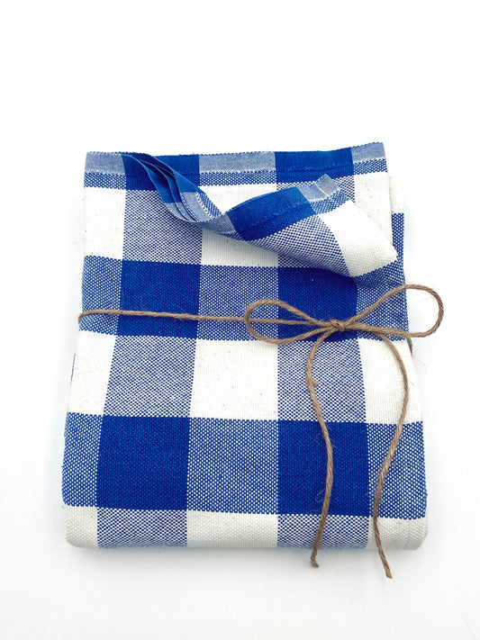 La nappe à carreaux bleus et blancs