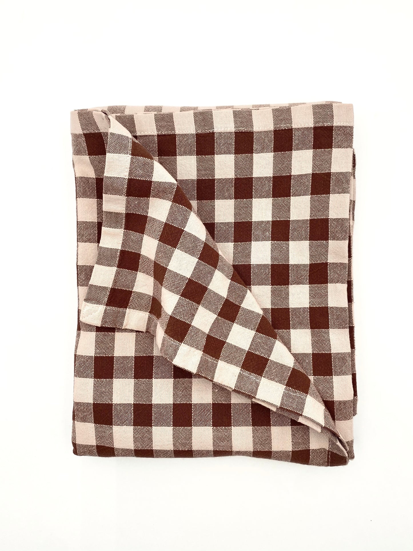 La nappe à carreaux marron