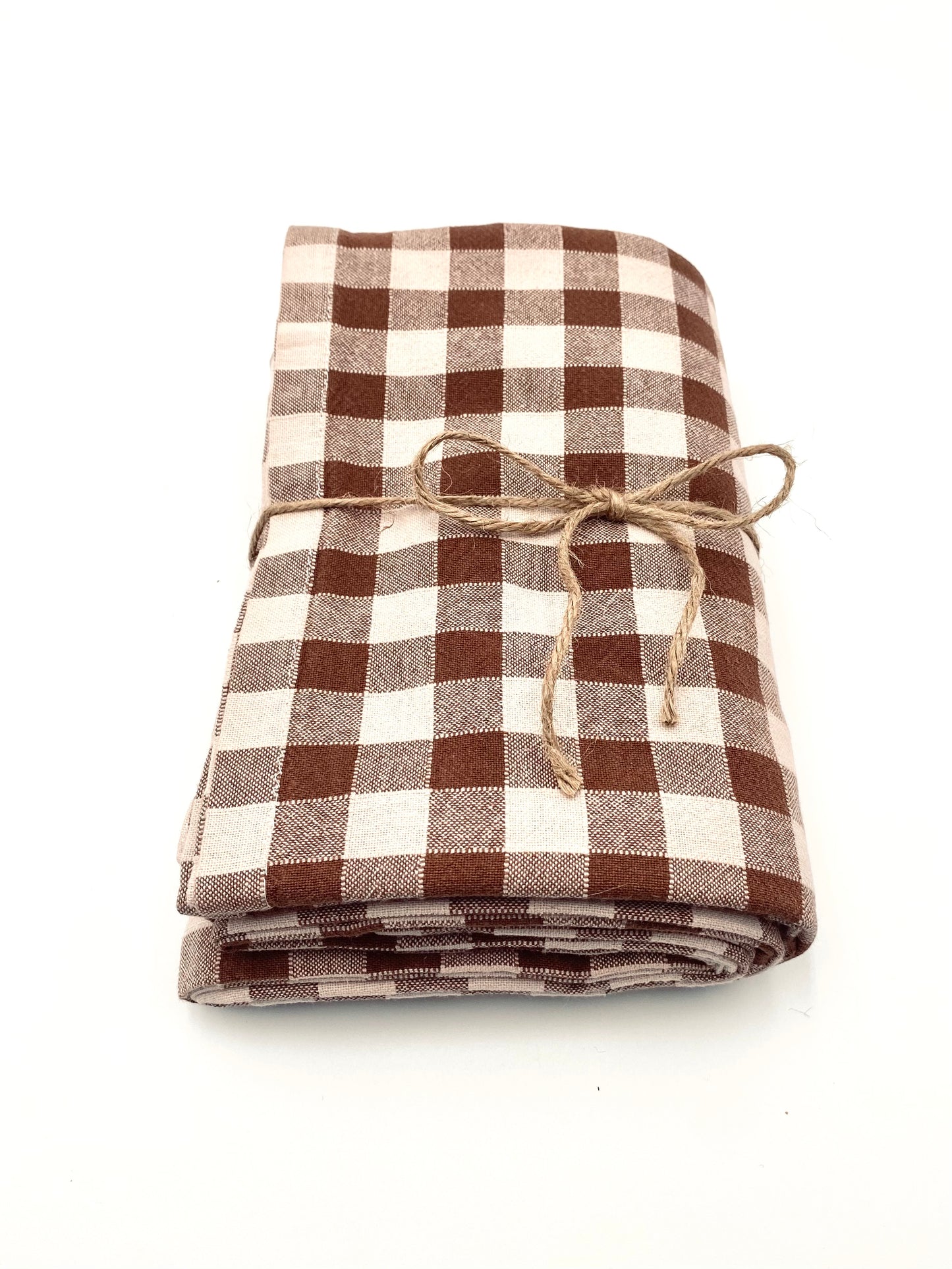 La nappe à carreaux marron