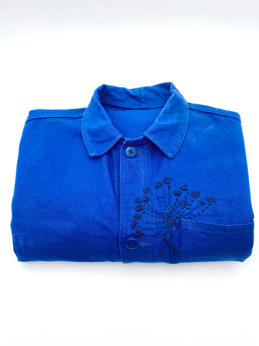 Le bleu de travail brodé