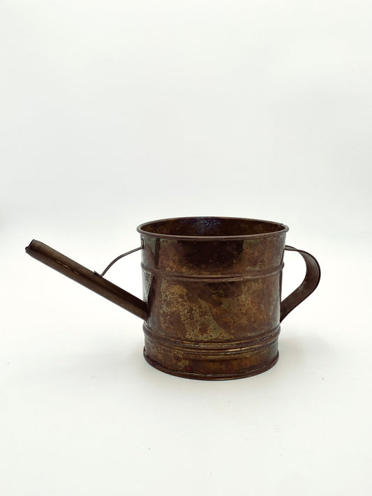 L'arrosoir en cuivre