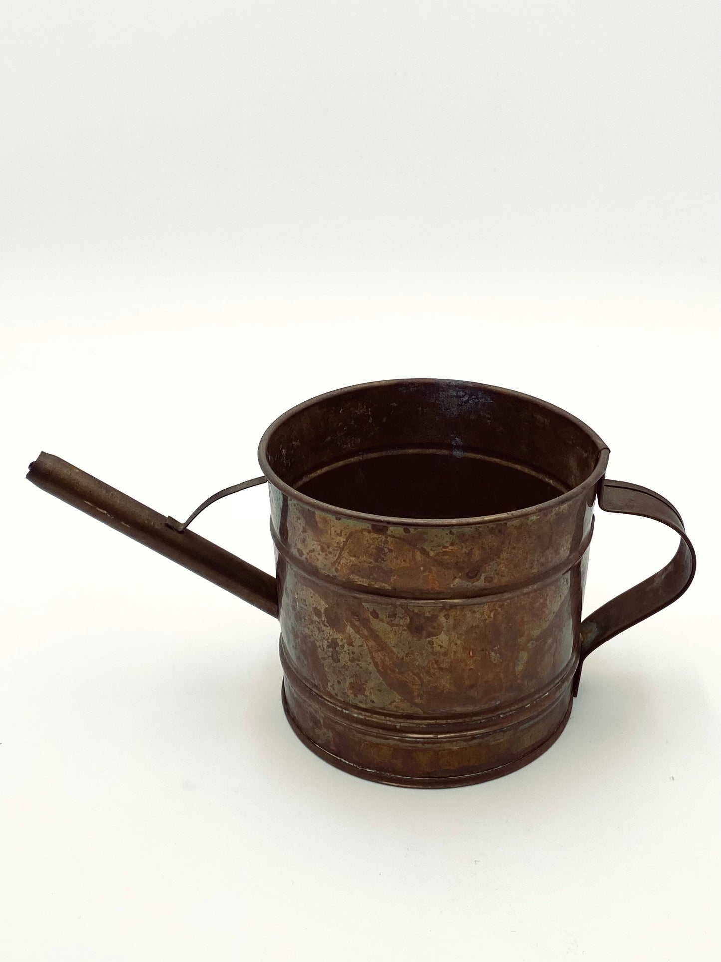 L'arrosoir en cuivre