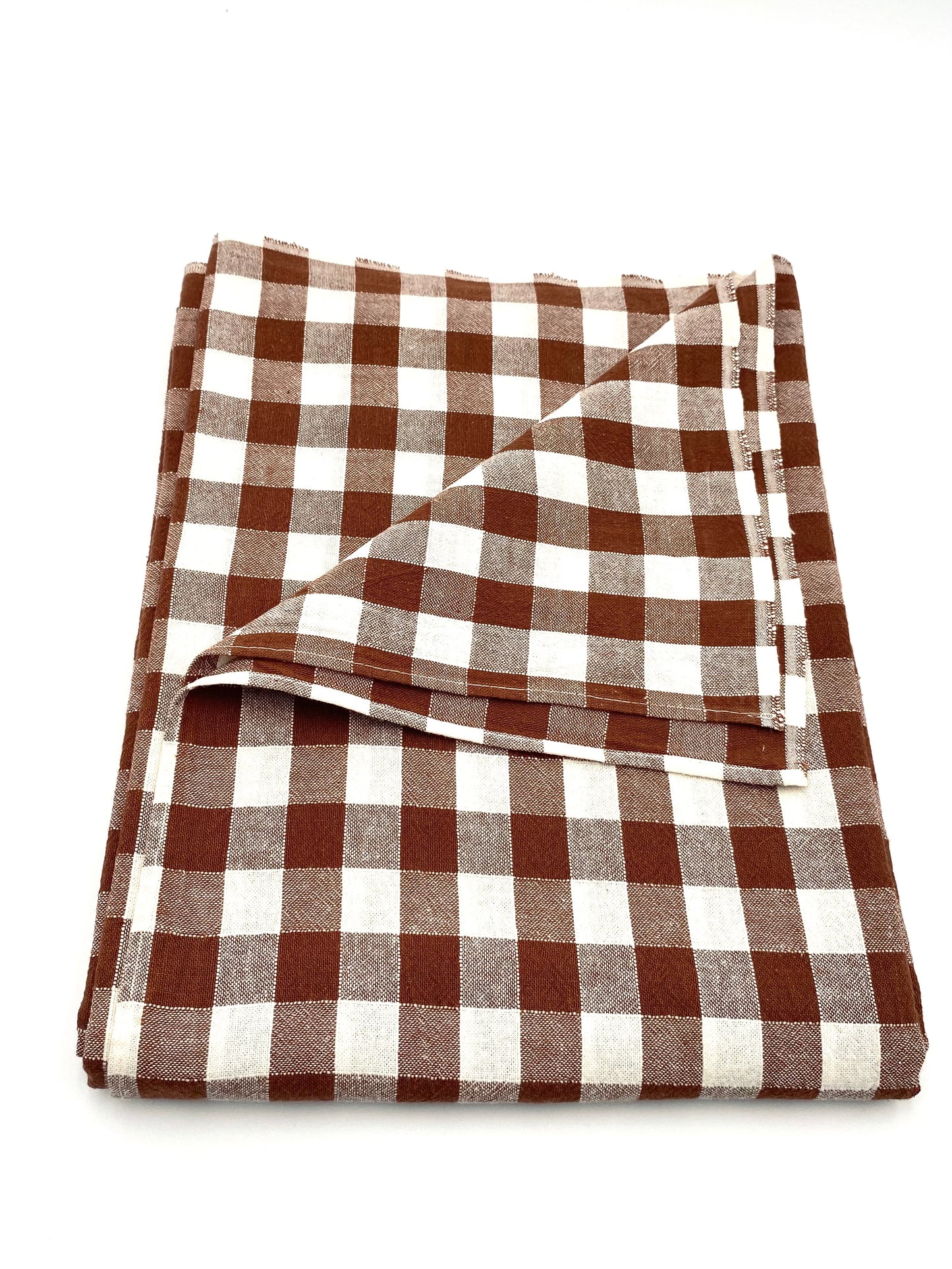 La nappe à carreaux avec 6 serviettes